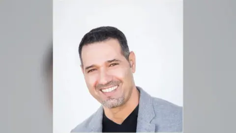 Gil, the scalp micropigmentation artist at HairDot.Ink